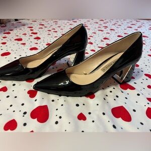 Women heels. Black, shinny, with gold metallic side of the heel from Zara.